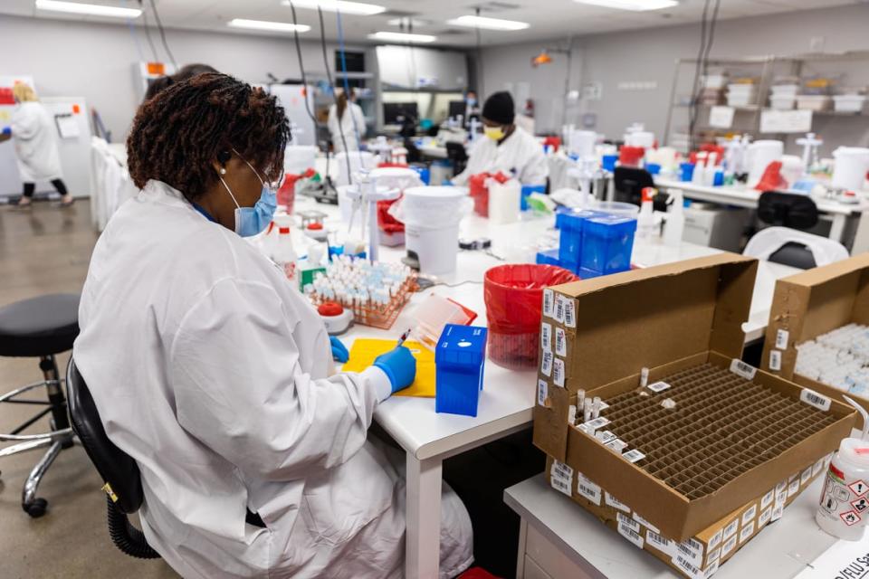 <div class="inline-image__caption"><p>Microbiologists with the AEGIS Sciences Corporation process COVID-19 and Monkeypox tests at its facility in Nashville, Tennessee, on Aug. 4, 2022.</p></div> <div class="inline-image__credit">Nathan Posner/Anadolu Agency via Getty</div>