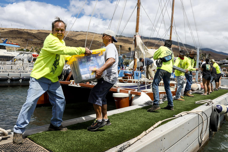 Maalaea, Maui, Monday, August 14, 2023 - Supplies for Lahaina fire victims are gathered and delivered by Hawaiians sailing on a large catamaran who often sail around the world together to Lahaina neighborhoods. (Robert Gauthier / Los Angeles Times via Getty Images)