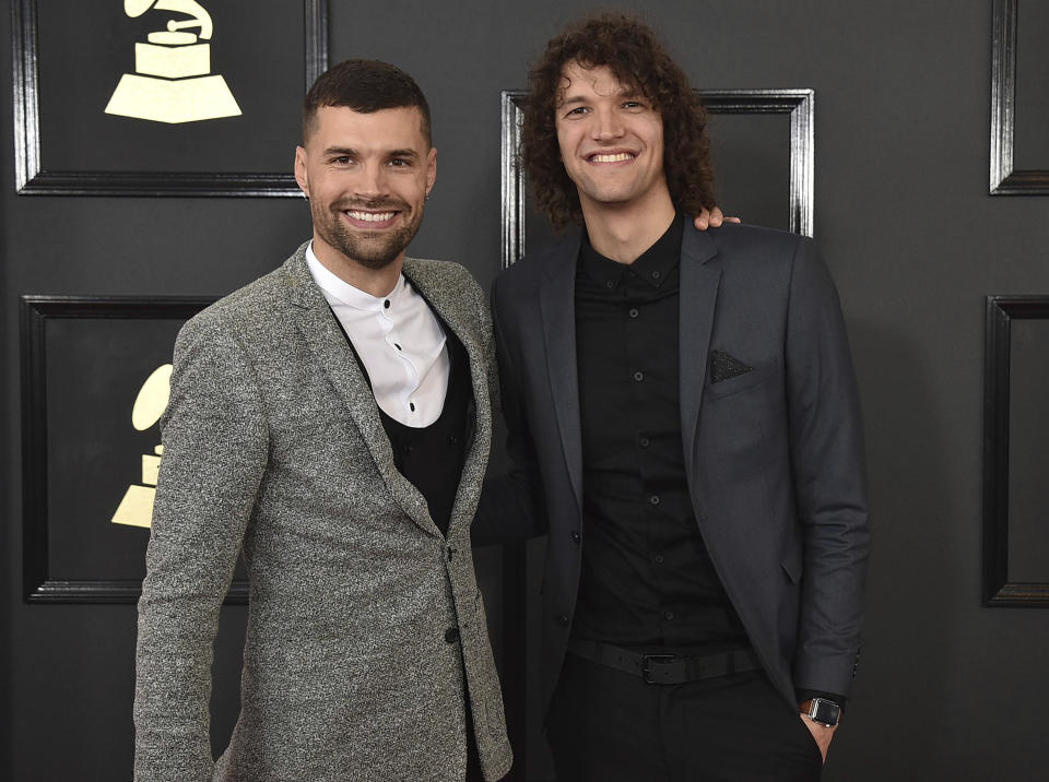 FILE - This Feb. 12, 2017 file photo shows Joel Smallbone, left, and Luke Smallbone of for King & Country arriving at the 59th annual Grammy Awards at the Staples Center in Los Angeles. Christian artists Zach Williams and for King & Country are the leading artist nominees at the 2020 Dove Awards, while rapper Kanye West and singer Gloria Gaynor earned their first ever nominations.(Photo by Jordan Strauss/Invision/AP, File)