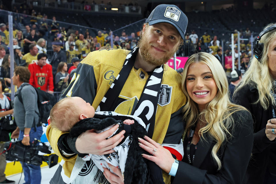 LAS VEGAS, NEVADA - JUNE 13: William Karlsson #71 of the Vegas Golden Knights, wife Emily and son Beckham pose after defeating the Florida Panthers to win the championship in Game Five of the 2023 NHL Stanley Cup Final at T-Mobile Arena on June 13, 2023 in Las Vegas, Nevada. (Photo by Bruce Bennett/Getty Images)