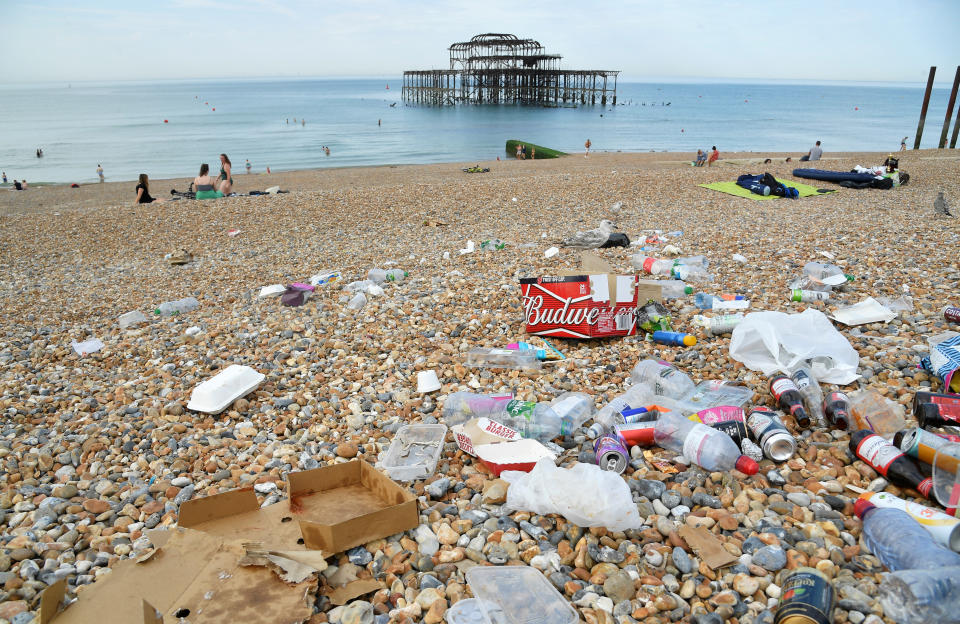 Litter is seen on the beach as people enjoy the sunny weather, amid the coronavirus disease (COVID-19) outbreak, in Brighton, Britain.