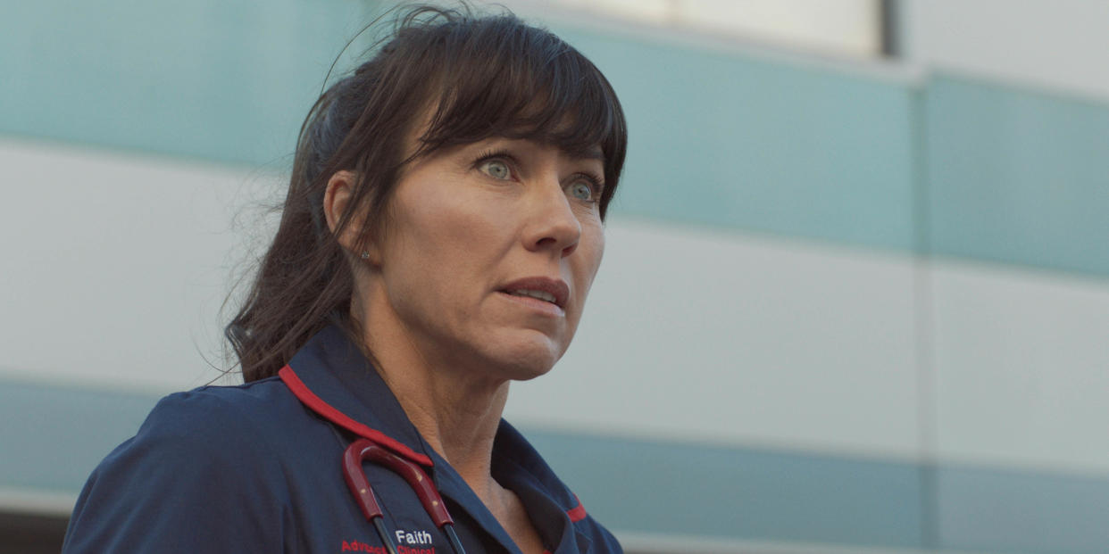  Casualty's Kirsty Mitchell as Faith Cadogan outside the hospital 