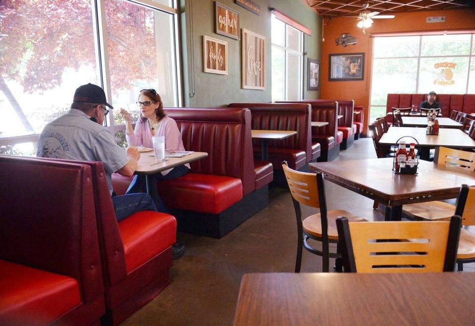 Ken and Brenda Phillips enjoy their brunch at the Waffle Shop on Figarden Drive in this Fresno Bee file photo from 2020. ERIC PAUL ZAMORA/ezamora@fresnobee.com