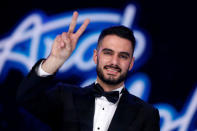 Palestinian singer Yaqoub Shaheen gestures after being announced winner of Arab Idol season 4, in Zouk Mosbeh area, north of Beirut, Lebanon February 25, 2017. REUTERS/Mohamed Azakir