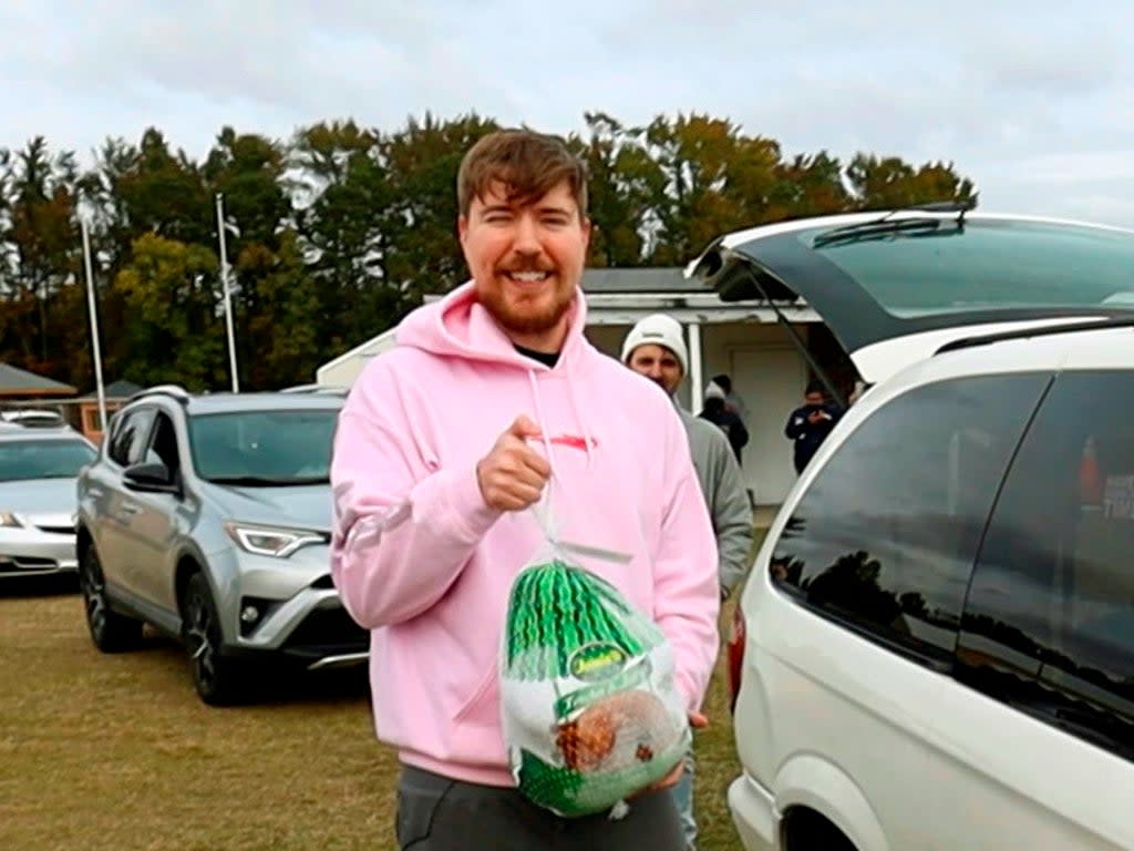 Jimmy Donaldson, aka MrBeast, at a turkey giveaway at Pitt County Fairgrounds in Greenville, North Carolina, in November 2021 (Beast Philanthropy Productions via AP)