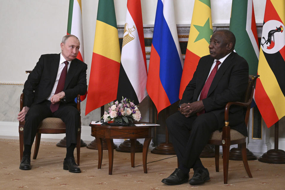 FILE - In this handout photo provided by Photo host Agency RIA Novosti, Russian President Vladimir Putin, left, holds a talk with South African President Cyril Ramaphosa, after a meeting with a delegation of African leaders and senior officials in St. Petersburg, Russia, on June 17, 2023. On July 27-28, 2023 Russian President Vladimir Putin is hosting delegations from almost all of Africa's 54 countries at the second Russia-Africa Summit. (Ramil Sitdikov/Photo host Agency RIA Novosti via AP, File)