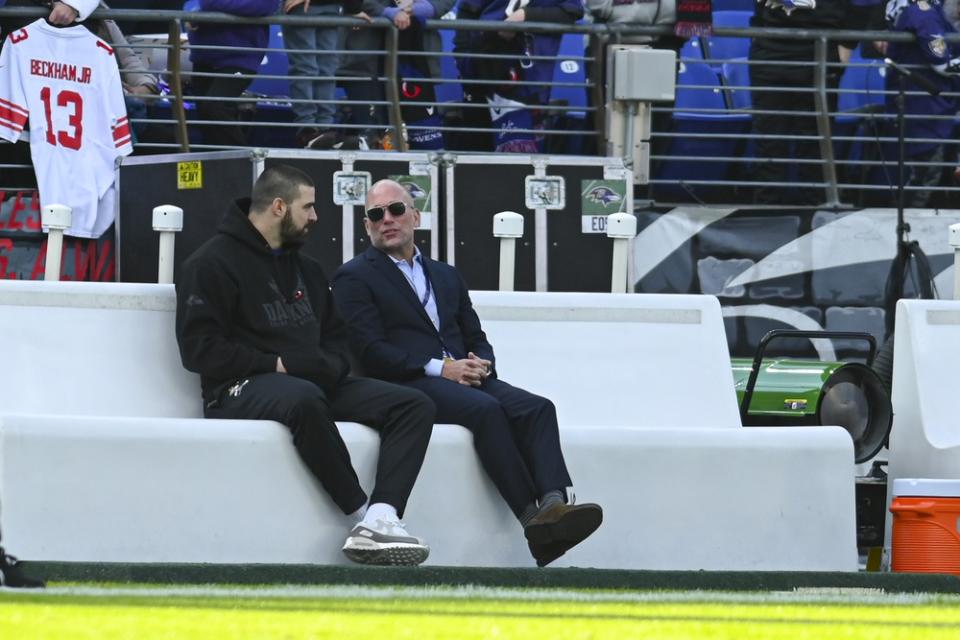 Dec 31, 2023; Baltimore, Maryland, USA; Baltimore Ravens general manager Eric DeCosta speaks with tight end Mark Andrews on the sidelines before the game against the Miami Dolphins at M&T Bank Stadium. Mandatory Credit: Tommy Gilligan-USA TODAY Sports