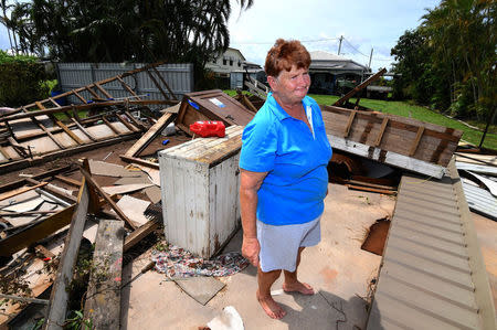 Local resident Helen Muller stands in a part of her home that was damaged by Cyclone Debbie in the town of Proserpine, located south of the northern Queensland town of Townsville in Australia. AAP/Dan Peled/via REUTERS