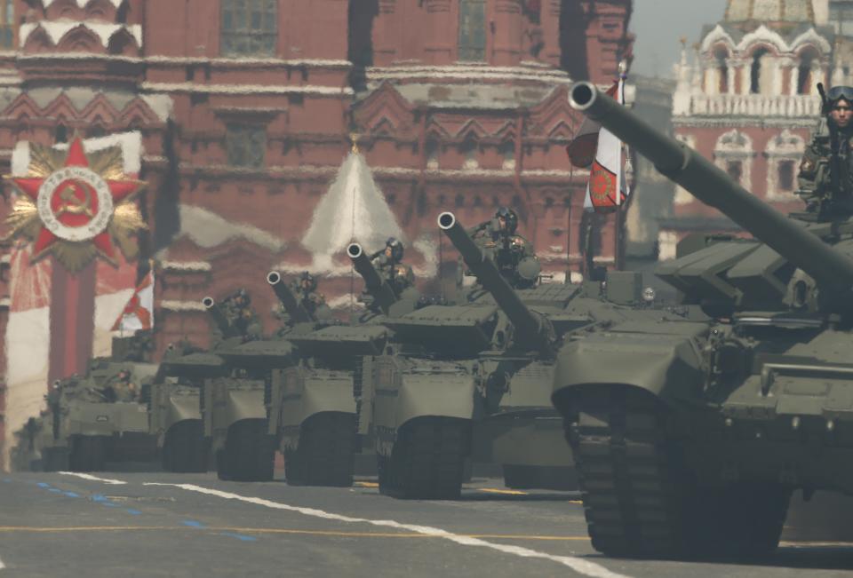 Russian army tanks roll toward Red Square during the Victory Day military parade marking the 75th anniversary of the Nazi defeat in Moscow, Russia, Wednesday, June 24, 2020. The Victory Day parade normally is held on May 9, the nation's most important secular holiday, but this year it was postponed due to the coronavirus pandemic. (AP Photo/Alexander Zemlianichenko)
