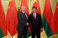 Chinese President Xi Jinping shakes hands with Belarusian President Alexander Lukashenko before the bilateral meeting of the Second Belt and Road Forum at the Great Hall of the People, in Beijing, China April 25, 2019. Andrea Verdelli/Pool via REUTERS