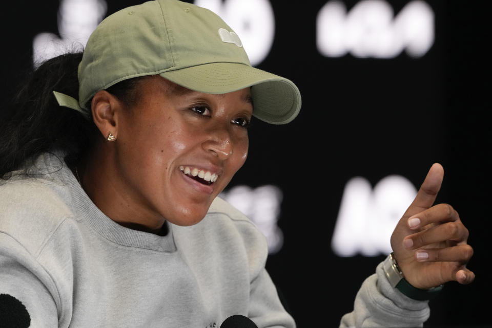 Japan's Naomi Osaka gestures during a press conference ahead of the Australian Open tennis championships at Melbourne Park, Melbourne, Australia, Friday, Jan. 12, 2024. (AP Photo/Mark Baker)