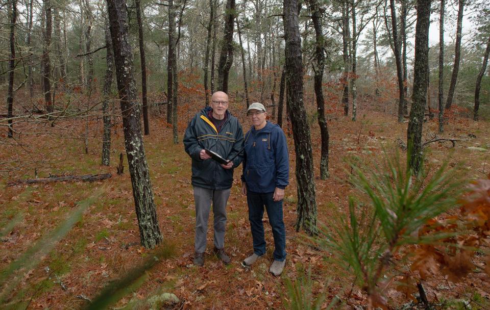 Orleans Historical Commission chair Ronald Peterson, left, and Ed Marcarelli at the Peck Property in East Orleans. The area was the site of an archeological survey last fall. The survey has shed new light on Wampanoag history.