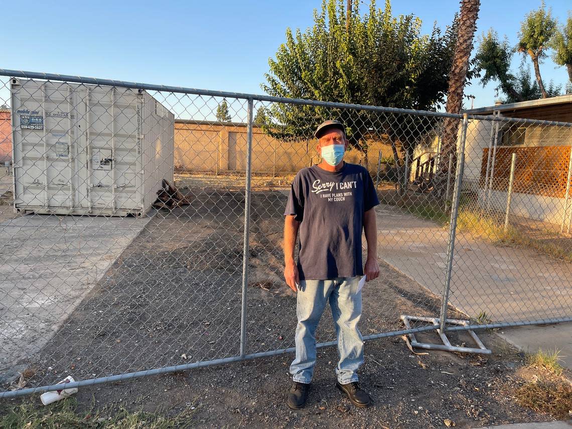 Billy Merle Hasting (58) stands in front of Space 22, where his trailer had stood before it was destroyed by the second fire at the Trails End Mobile Park. Hasting is now facing eviction. Oct. 5, 2022