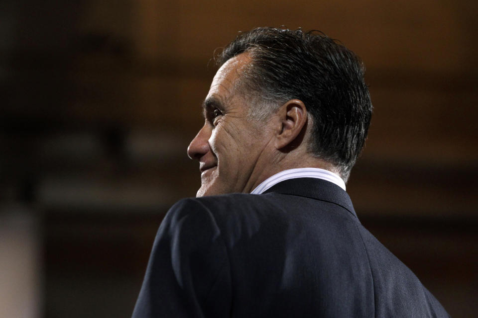 Republican presidential candidate, former Massachusetts Gov. Mitt Romney smiles during his campaign rally at Consol Energy Research and Development Facility in South Park Township, Pa., Monday, April 23, 2012. (AP Photo/Jae C. Hong)