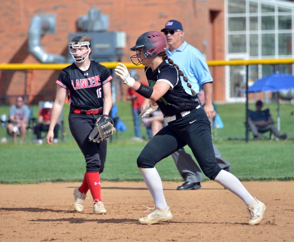 South Hagerstown's Mackenzie Lamer, who hit an RBI double in the fourth inning, advances to third base on a passed ball in front of Linganore shortstop Bradyn MacKay.