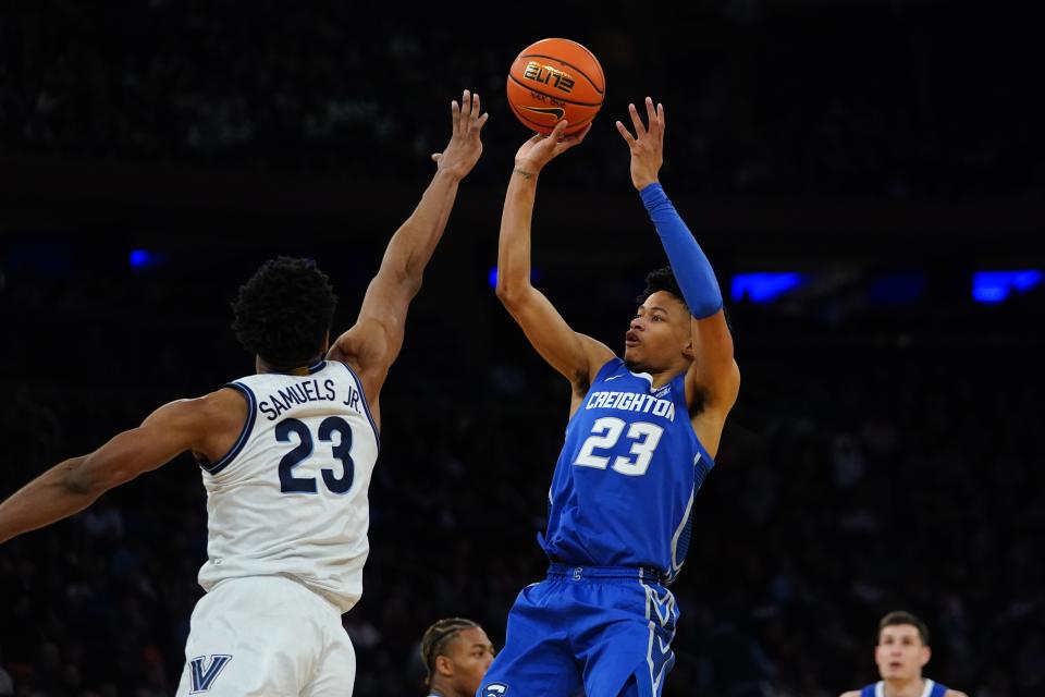 Creighton's Trey Alexander, front right, shoots over Villanova's Jermaine Samuels, left, during the second half of an NCAA college basketball game in the final of the Big East conference tournament Saturday, March 12, 2022, in New York. (AP Photo/Frank Franklin II)