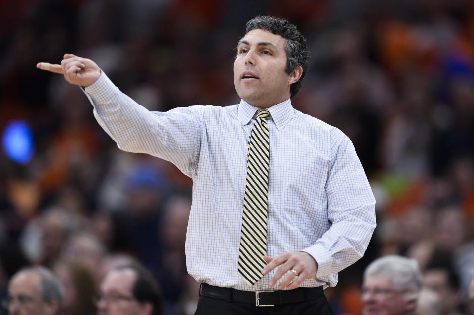 Georgia Tech head coach Josh Pastner directs players during the second half of an NCAA college basketball game against Syracuse in Syracuse, N.Y., Tuesday, Feb. 28, 2023. (AP Photo/Adrian Kraus)