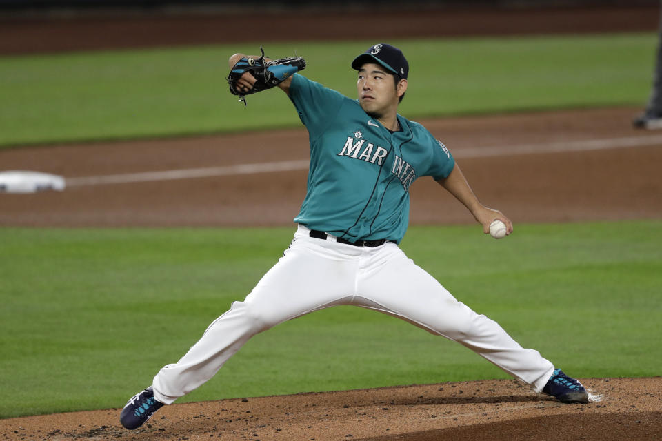 Seattle Mariners starting pitcher Yusei Kikuchi throws against the Colorado Rockies in the second inning of a baseball game Friday, Aug. 7, 2020, in Seattle. (AP Photo/Elaine Thompson)