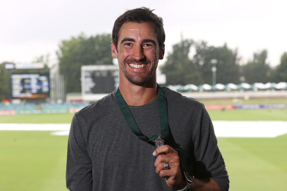 Mitchell Starc, pictured here with the Allan Border Medal at Manuka Oval.