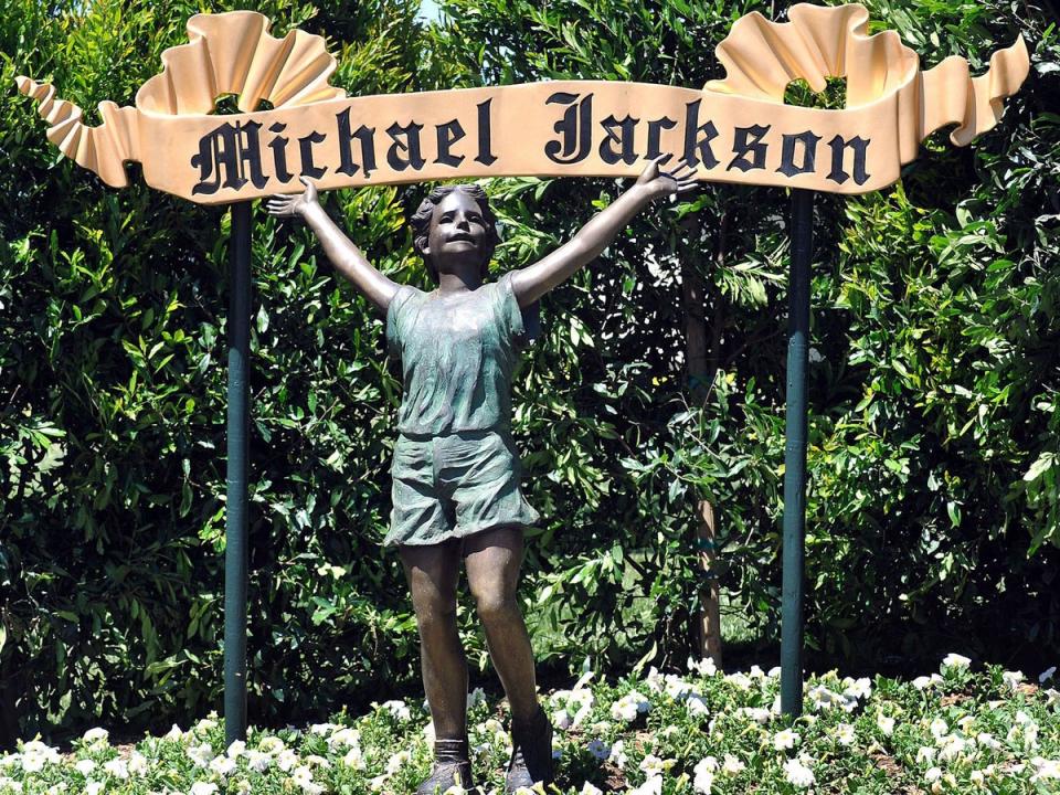 One of two welcome signs that marked the entrance to the ranch, which Jackson named for the fantasy world inhabited by Peter Pan, the boy who never grew up (Rex Features)