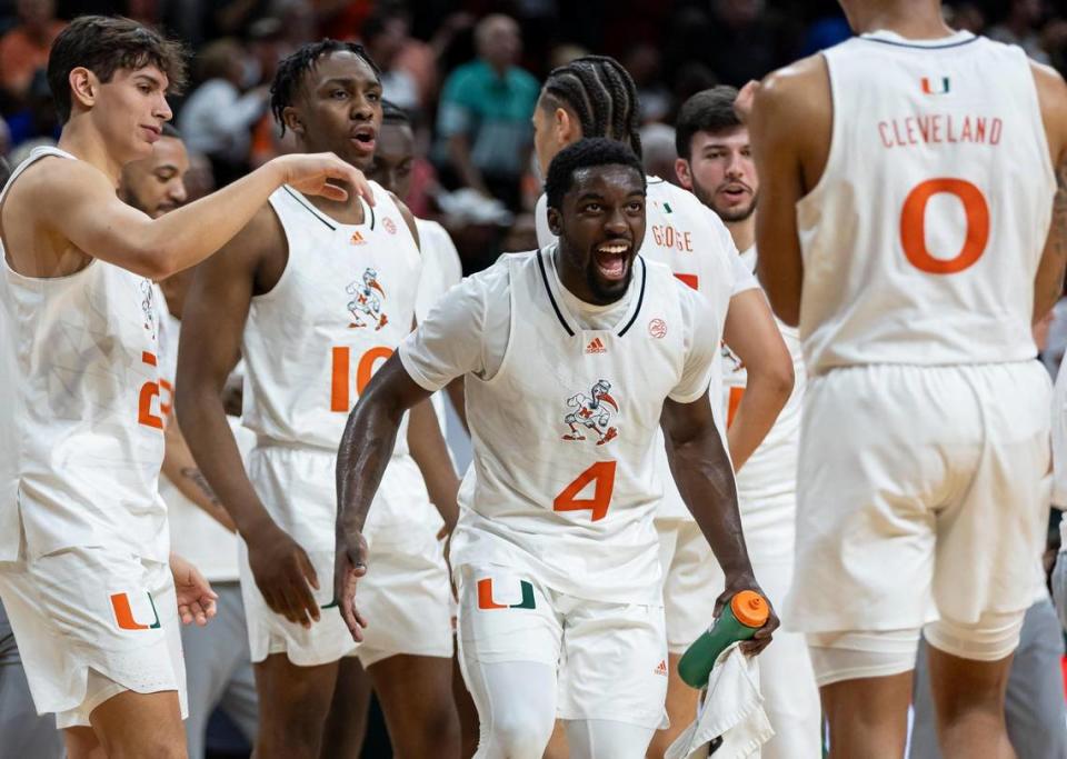 Miami Hurricanes guard Bensley Joseph (4) reacts after his team scored against the Virginia Tech Hokies during the second half of their NCAA basketball game at the Watsco Center on Saturday, Feb. 3, 2024, in Coral Gables, Fla.