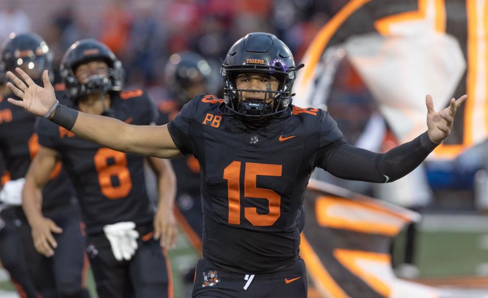 Massillon quarterback DaOne Owens takes the field with his teammates before playing St. John's (D.C.), Friday Sept. 29, 2023..