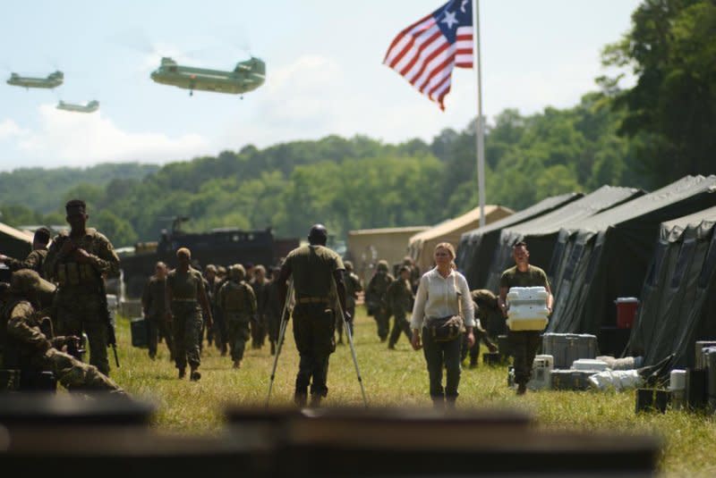 Lee (Kirsten Dunst) stops in a Western Forces camp. Photo courtesy of A24