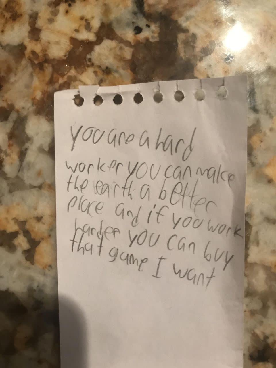 The note detailed how the boy's father should work harder so he could buy his son a video game. Photo: Reddit/The_Dream_Walker