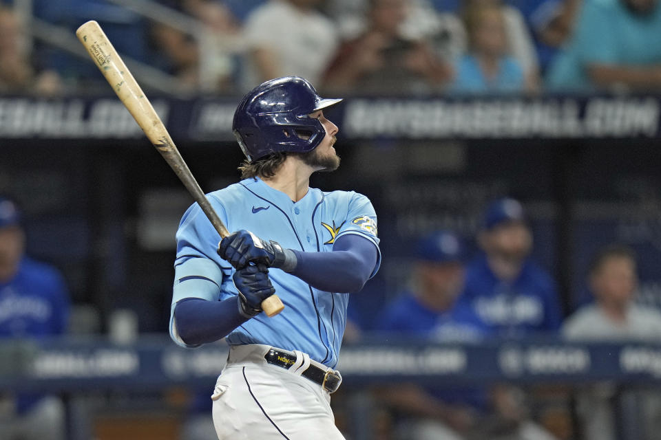 Tampa Bay Rays' Josh Lowe watches his walk-off single off Toronto Blue Jays relief pitcher Jordan Romano during the ninth inning of a baseball game Saturday, Sept. 23, 2023, in St. Petersburg, Fla. (AP Photo/Chris O'Meara)