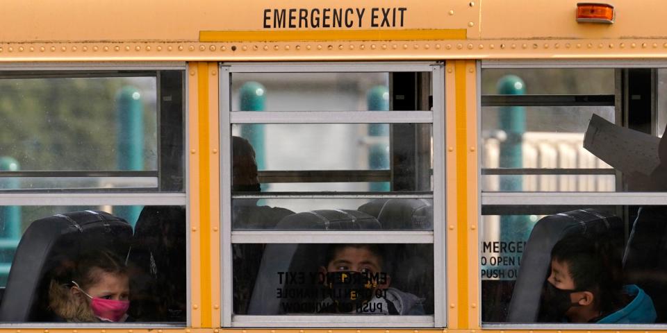 Kids on a school bus.