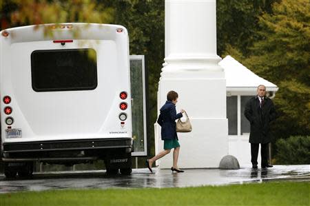 Senator Susan Collins (R-ME) steps out from the bus as she arrives with other members of the Senate Republican Caucus for a meeting with U.S. President Barack Obama at the White House in Washington October 11, 2013. REUTERS/Kevin Lamarque