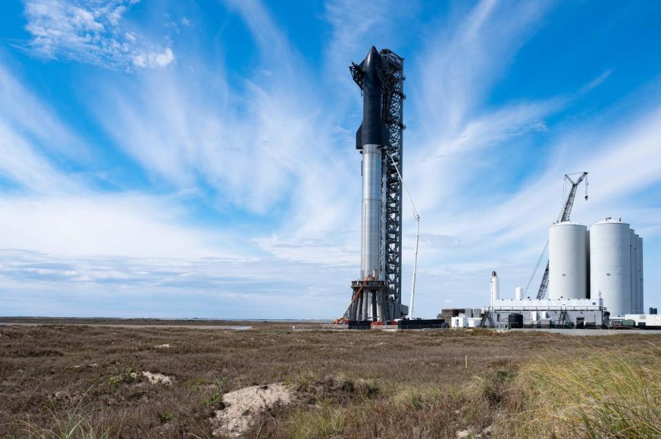 <div class="inline-image__caption"><p>SpaceX's first orbital Starship SN20 is stacked atop its massive Super Heavy Booster 4 at the company's Starbase facility near Boca Chica Village in South Texas on February 10, 2022.</p></div> <div class="inline-image__credit">Jim Watson/AFP via Getty Images</div>