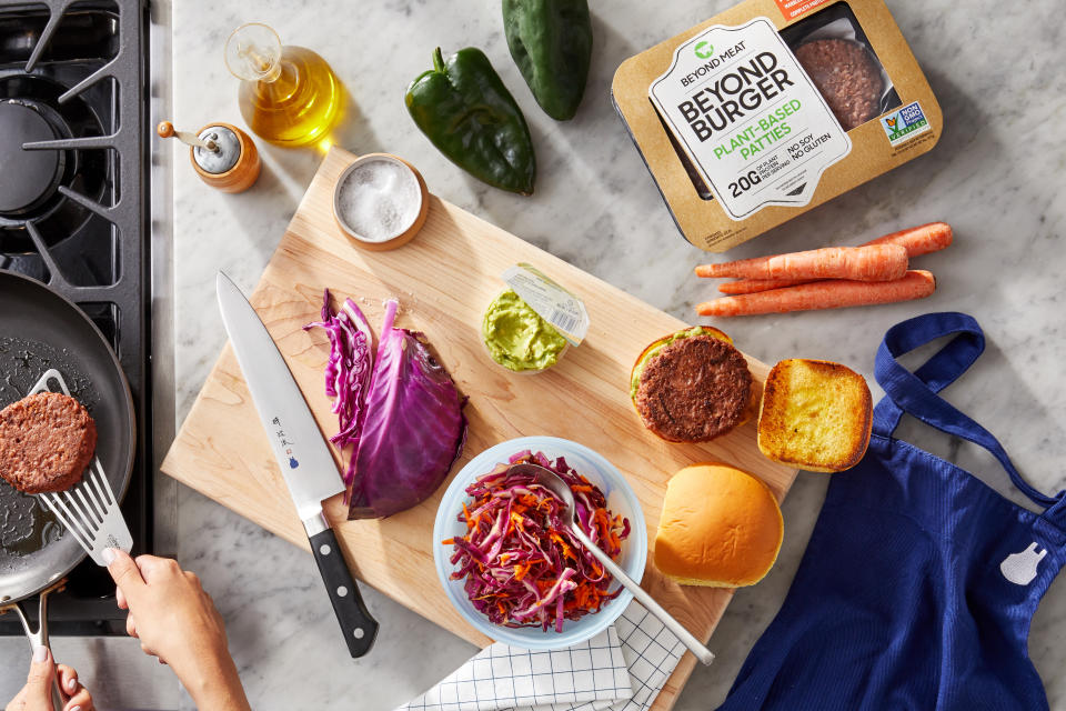 Meal ingredients including the Beyond Burger on a kitchen countertop.