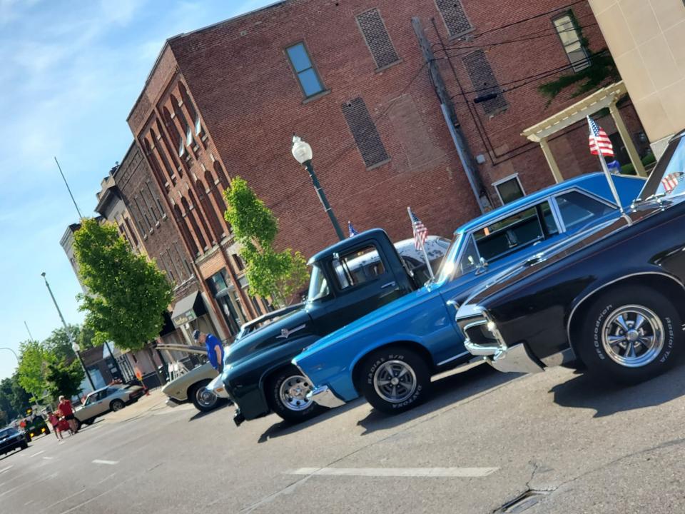 Cars on display at last year's Open Air Market and Music Festival are shown. The car show is returning this year.
