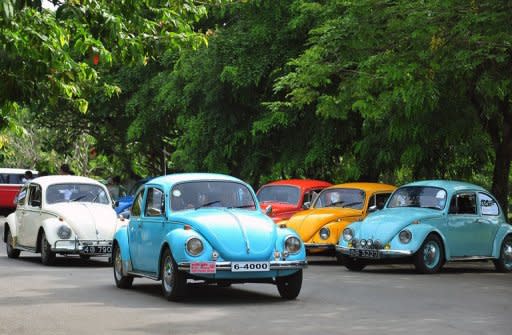 Vintage Volkswagen Beetle cars at a rally in Colombo, Sri Lanka, last month. Volkswagen says net profits in the first half of the year soared by 36% as Europe's biggest car maker sold 4.6 mn cars worldwide