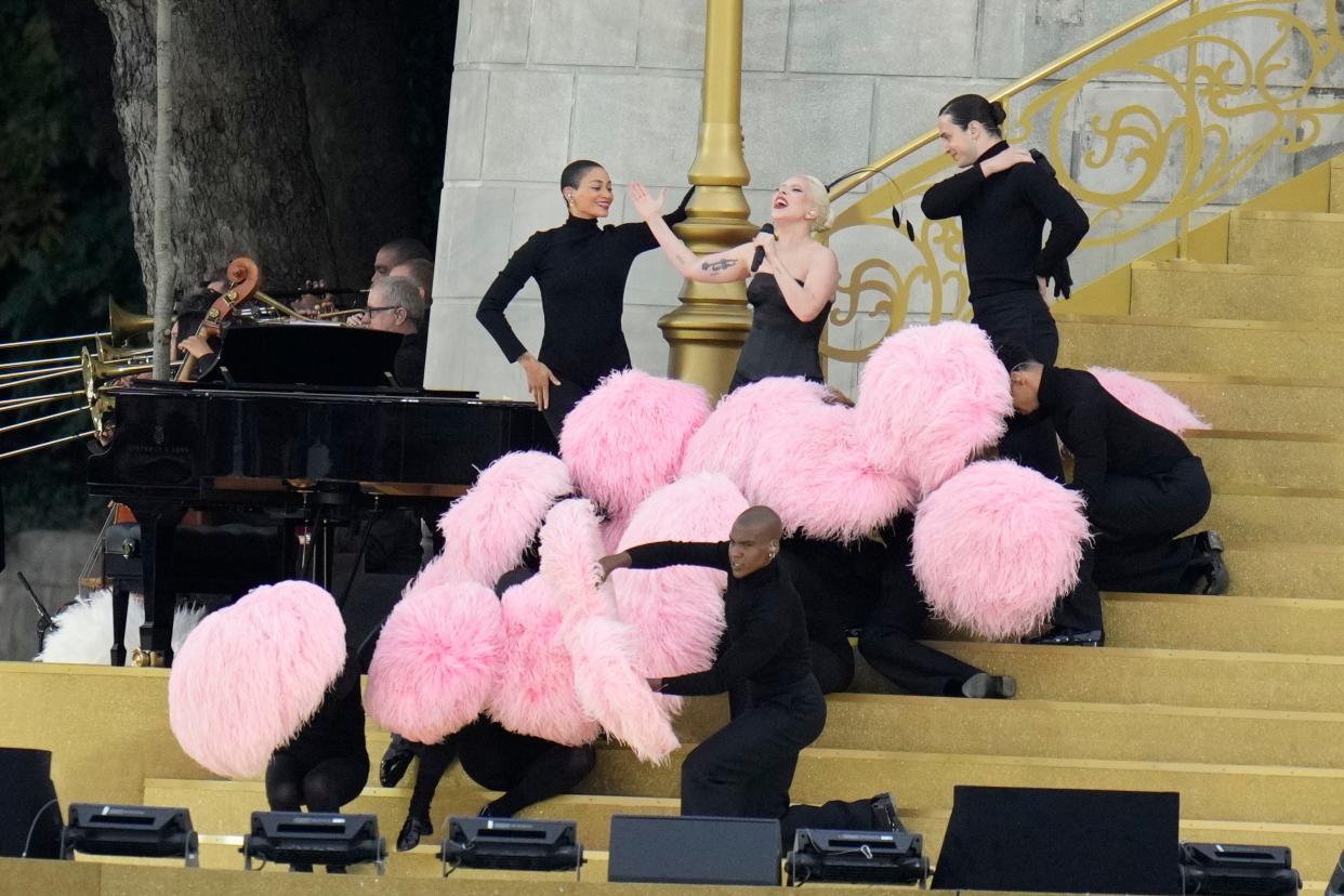 Lady Gaga performs at the Sully bridge area during the opening ceremony.