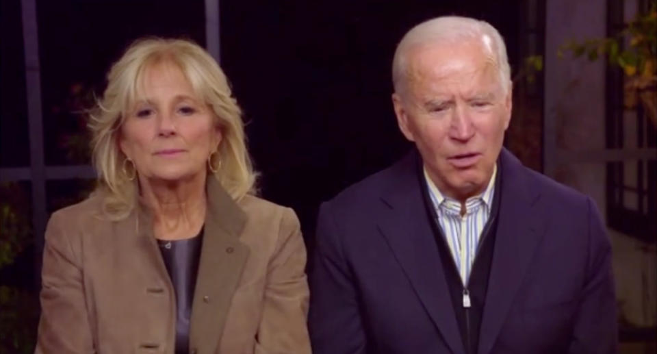 Biden and his wife are seen with concerned faces after his error.