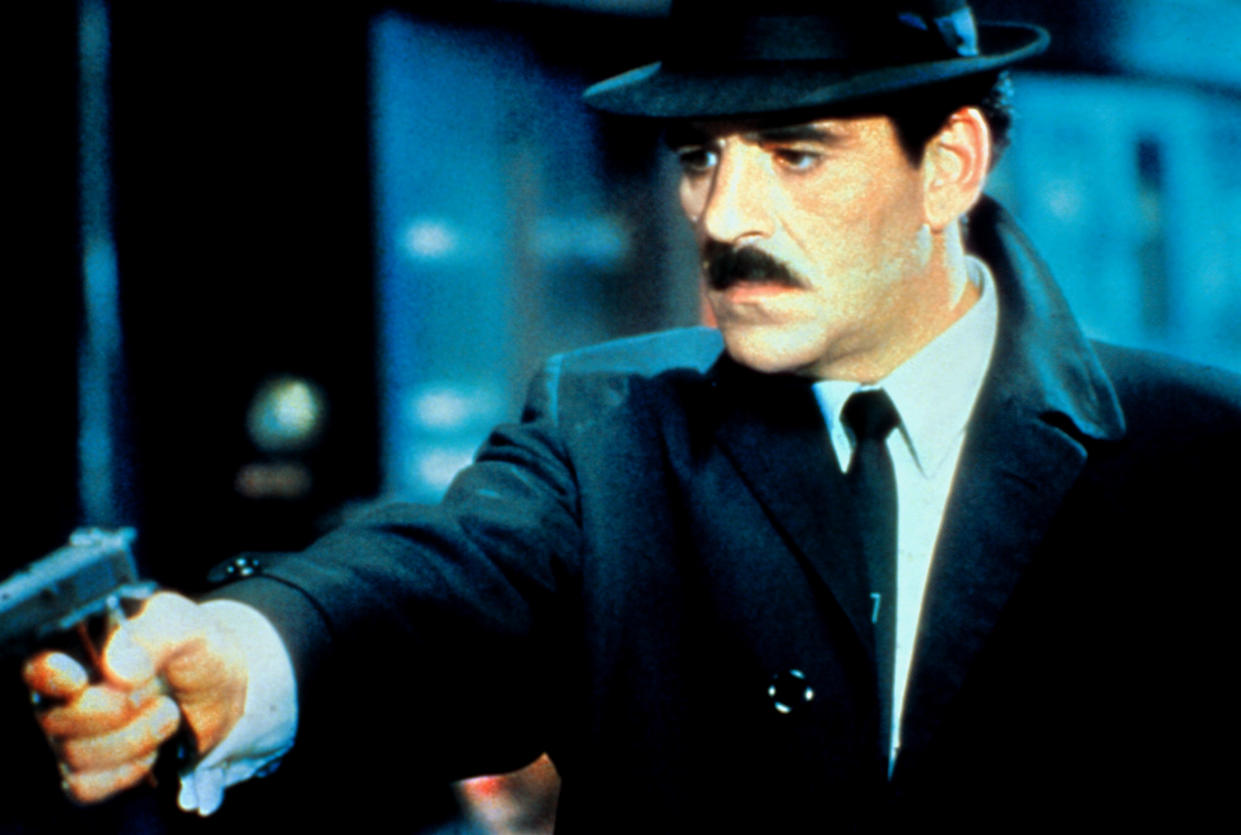 Dennis Farina in “Crime Story” - Credit: Everett