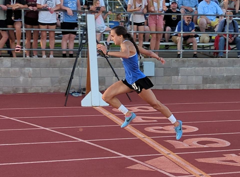 U-Prep senior Emma Gaddy crosses the finish line, winning the 200 meters race at the CIF Northern Section Track and Field Championships at West Valley High School on Friday, May 19, 2023.