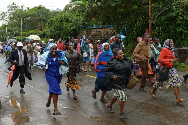 Kenyan media said 200,000 people headed to the park for the mass, most in high spirits despite the inclement weather