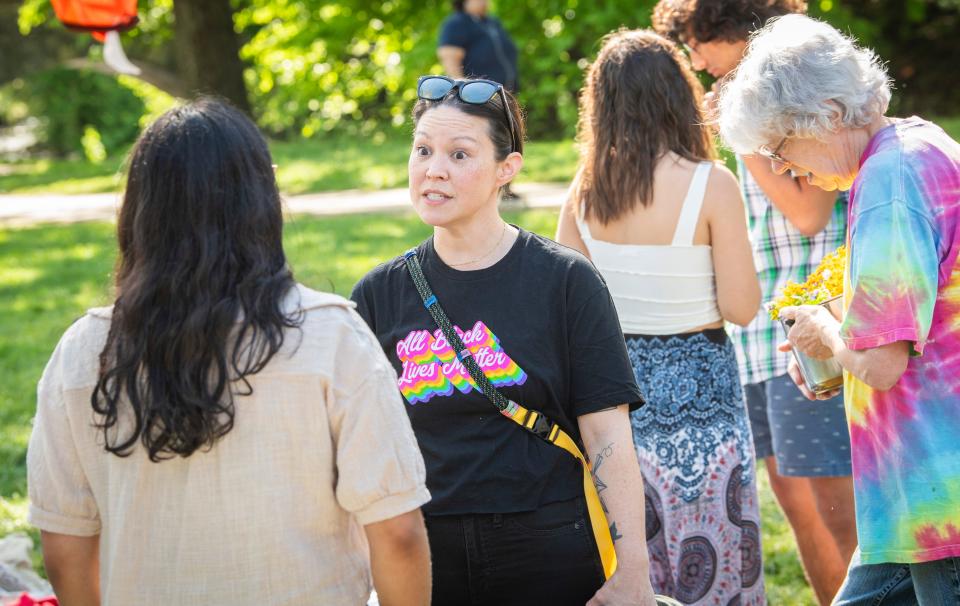 Organizer April Hennessey speaks to pro-Palestinian demonstrators in Dunn Meadow on Tuesday, April 30, 2024.