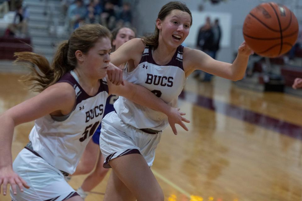Red Bank Josie Munson and Camryn Gardner chase down a loose ball in first half action. Rumson-Fair Haven Girls basketball edges out out Red Bank Regional 44-36 on January 3, 2023 in Red Bank NJ. 