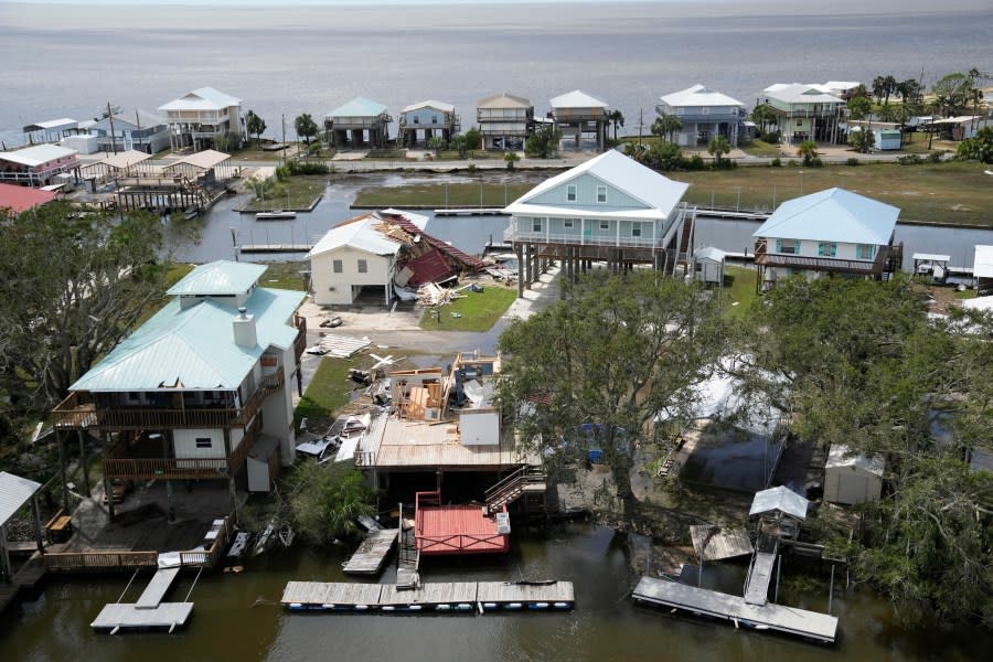 In this photo made in a flight provided by mediccorps.org, a destroyed home is seen in Keaton Beach, Fla., following the passage of Hurricane Idalia, Wednesday, Aug. 30, 2023. (AP Photo/Rebecca Blackwell)
