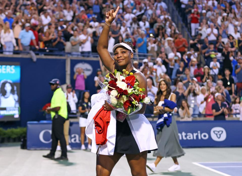 Serena Williams of the United States waves to the crowd as she leaves the court after losing to Belinda Bencic of Switzerland during the National Bank Open, part of the Hologic WTA Tour, at Sobeys Stadium on August 10, 2022 in Toronto, Ontario, Canada.