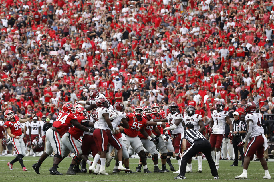 Georgia placekicker Rodrigo Blankenship (98) looks on as his field goal kick goes wide left during the second overtime against South Carolina in an NCAA college football game in Athens, Ga., on Saturday, Oct. 12, 2019. South Carolina won 20-17 in double overtime. (Joshua L. Jones/Athens Banner-Herald via AP)