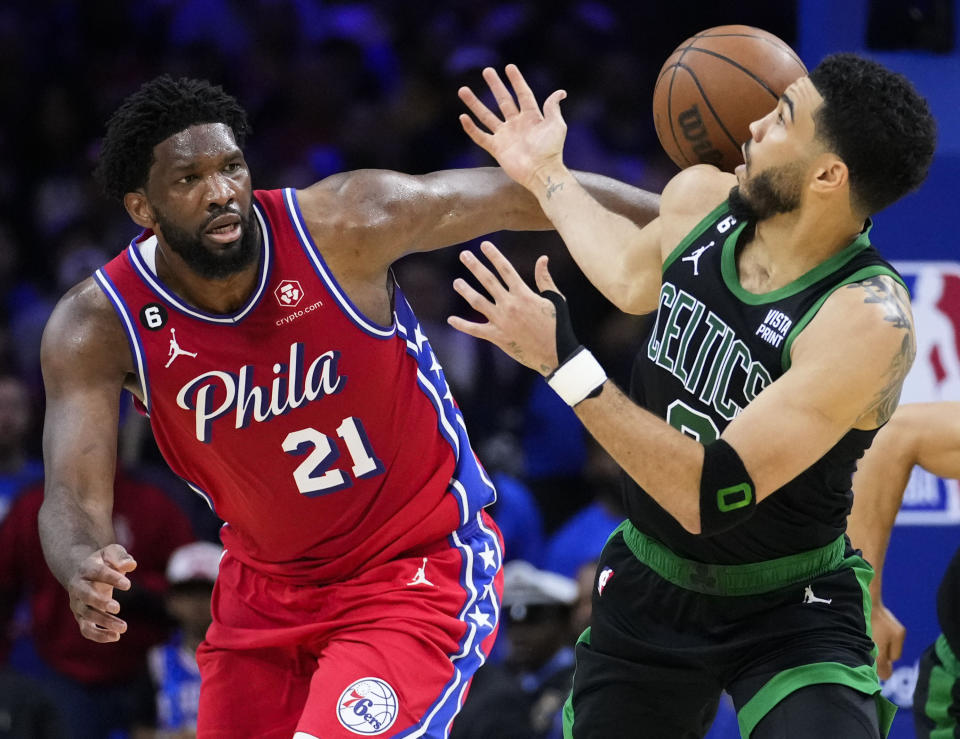 Boston Celtics' Jayson Tatum, right, steals the ball from Philadelphia 76ers' Joel Embiid, left, during the second half of Game 3 in an NBA basketball Eastern Conference semifinals playoff series, Friday, May 5, 2023, in Philadelphia. (AP Photo/Matt Slocum)