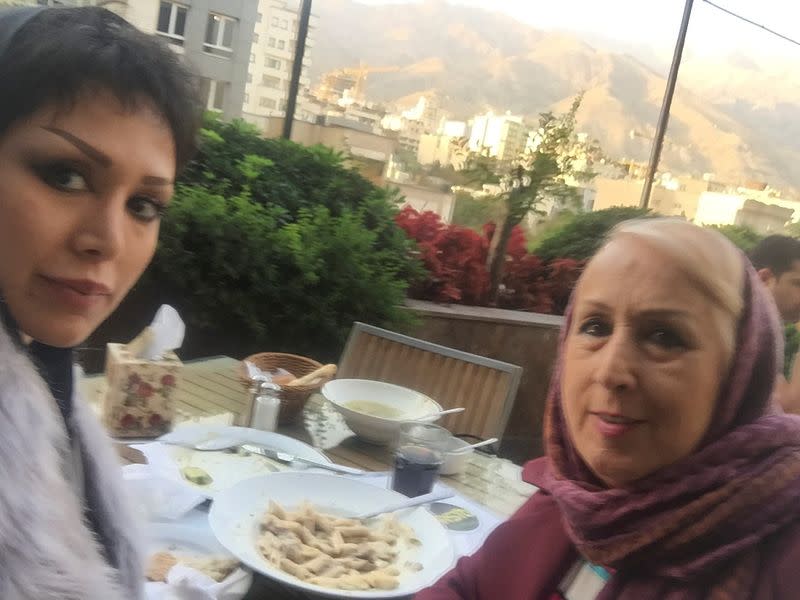 Mania Darbani and her mother Maryam Taghdissi Jani are seen in a restaurant in Tehran, Iran
