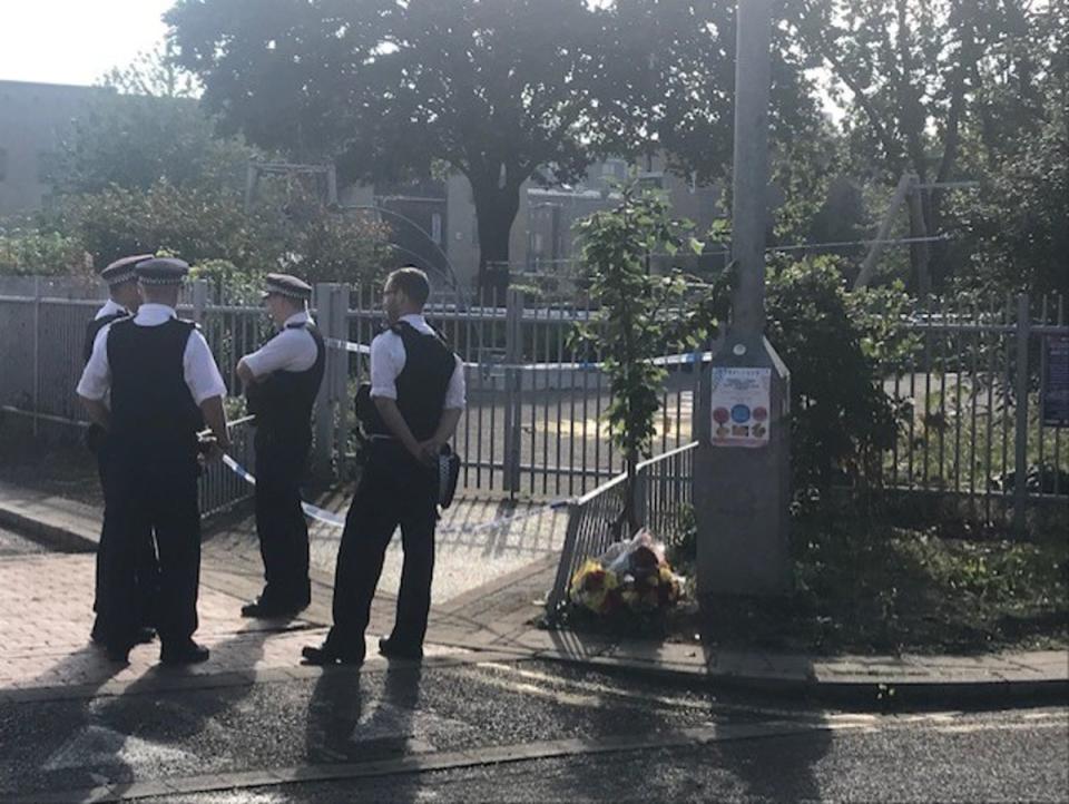 Police guard the playground on Morrison Road, Angell Town, Brixton  on Tuesday (John Dunne)