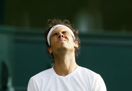 Rafael Nadal of Spain reacts during his match against Dustin Brown of Germany at the Wimbledon Tennis Championships in London, July 2, 2015. REUTERS/Stefan Wermuth