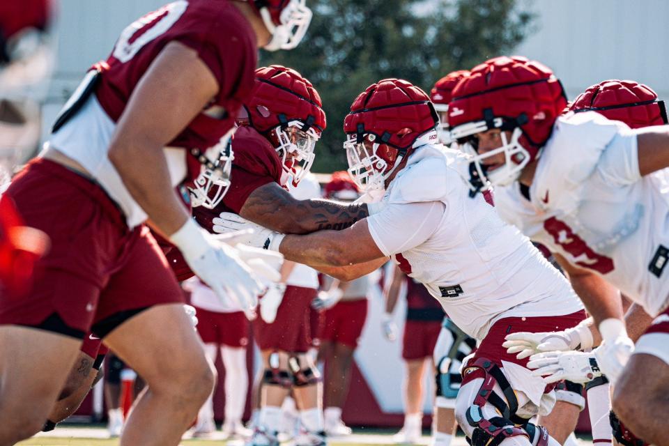 The Arkansas offensive and defensive lines go head-to-head during fall camp. Starters for the Week 1 game against Western Carolina were announced Monday.